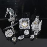 Various crystal glass figurines, including Swarovski hedgehog, Edinburgh Crystal swan etc