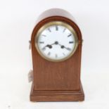 An early 20th century oak-cased 8-day dome-top mantel clock, with brass carrying handles and