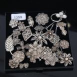 A quantity of silver filigree brooches, pendants and necklaces