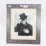 ELTON JOHN - a hand signed photograph, framed, overall 38cm x 32cm