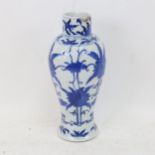 A Chinese blue and white porcelain baluster vase (A/F), height 22cm