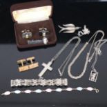 A pair of silver and enamel cufflinks, and tie clip, silver bracelets, a crucifix etc