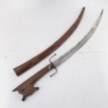 A Middle Eastern/Persian curved sword, with chip carved wood handle and scabbard, blade length 39cm