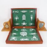 2 framed displays of ship's knots, width 48cm, and a pair of oak bookends with Royal Airforce