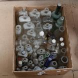 A box of bottles, including Boots, milk bottles etc