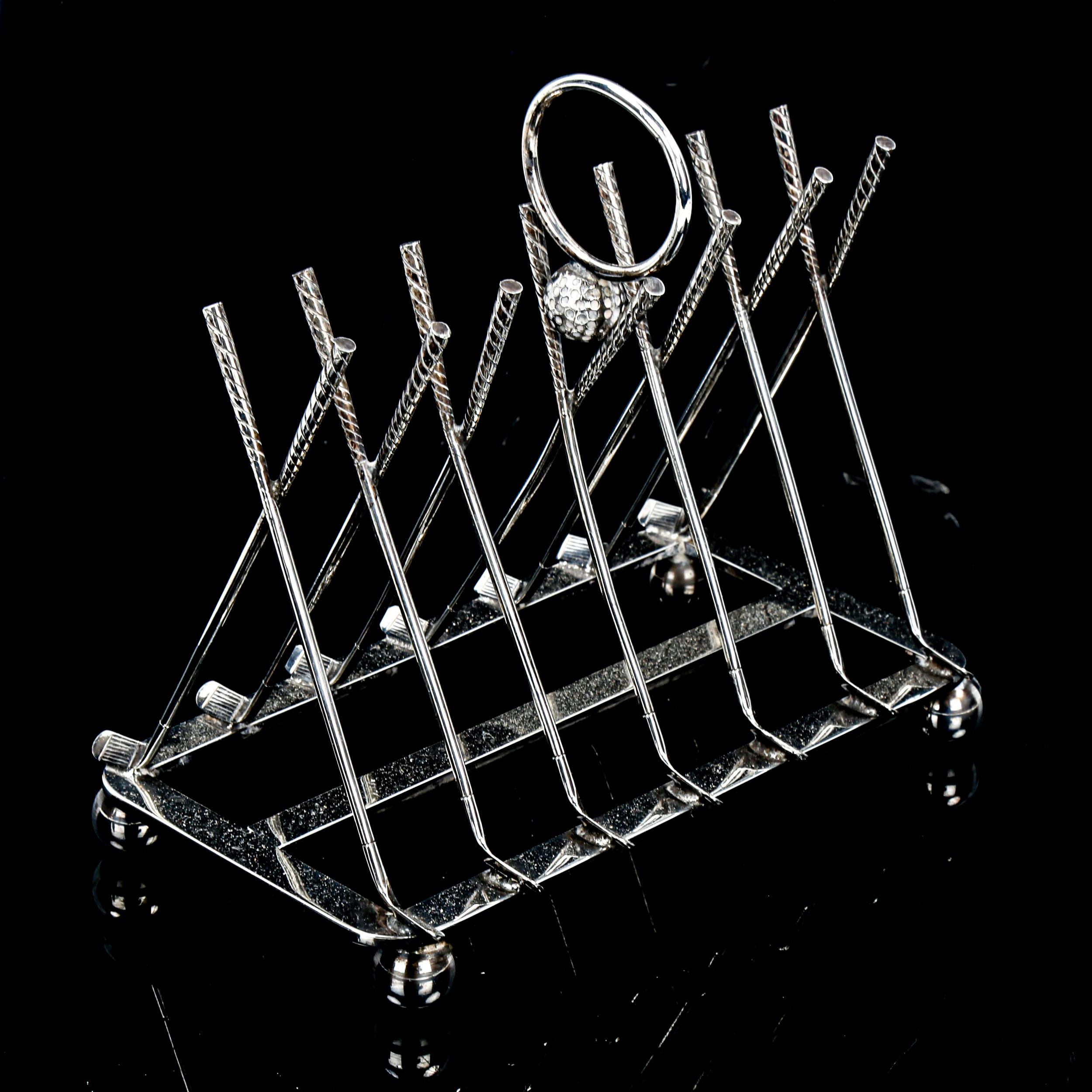 A plated golf club design toast rack, circa 1900, length 16cm