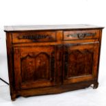 A French 18th century Poplar dresser base, with 2 frieze drawers and panelled cupboards under, width