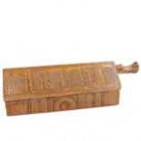 A Folk Art chip carved mahogany novelty candle / offertory box, in the form of a house, with allover