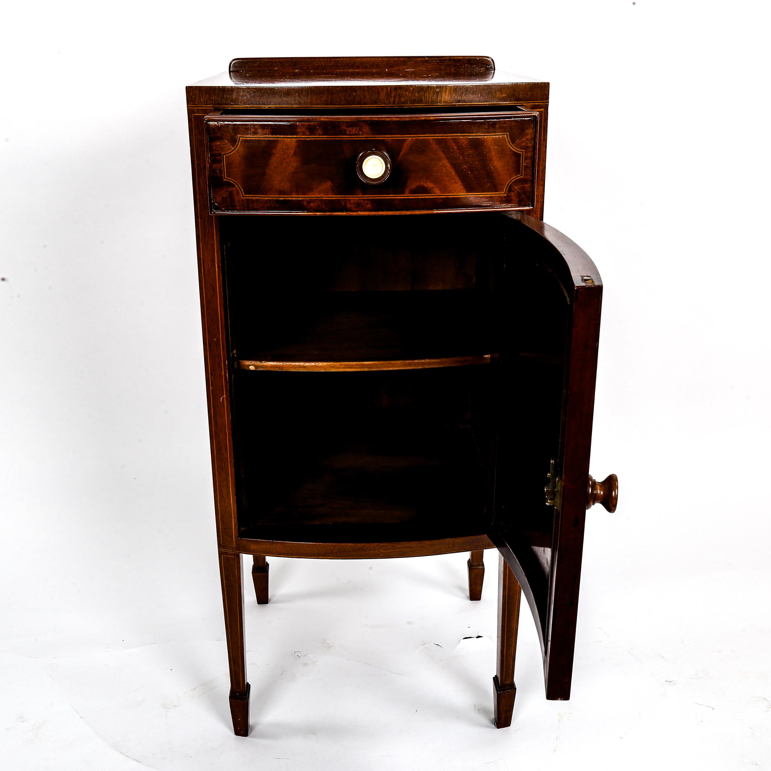 An Edwardian mahogany bow-front bedside cupboard, with frieze drawer and ivory-mounted handles, - Image 3 of 3