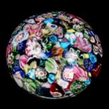 Millefiori glass paperweight with twisted canes, diameter 8cm