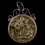 An Edward VII 1909 gold full sovereign coin, on unmarked gold pendant mount, 8.7g Surface wear and