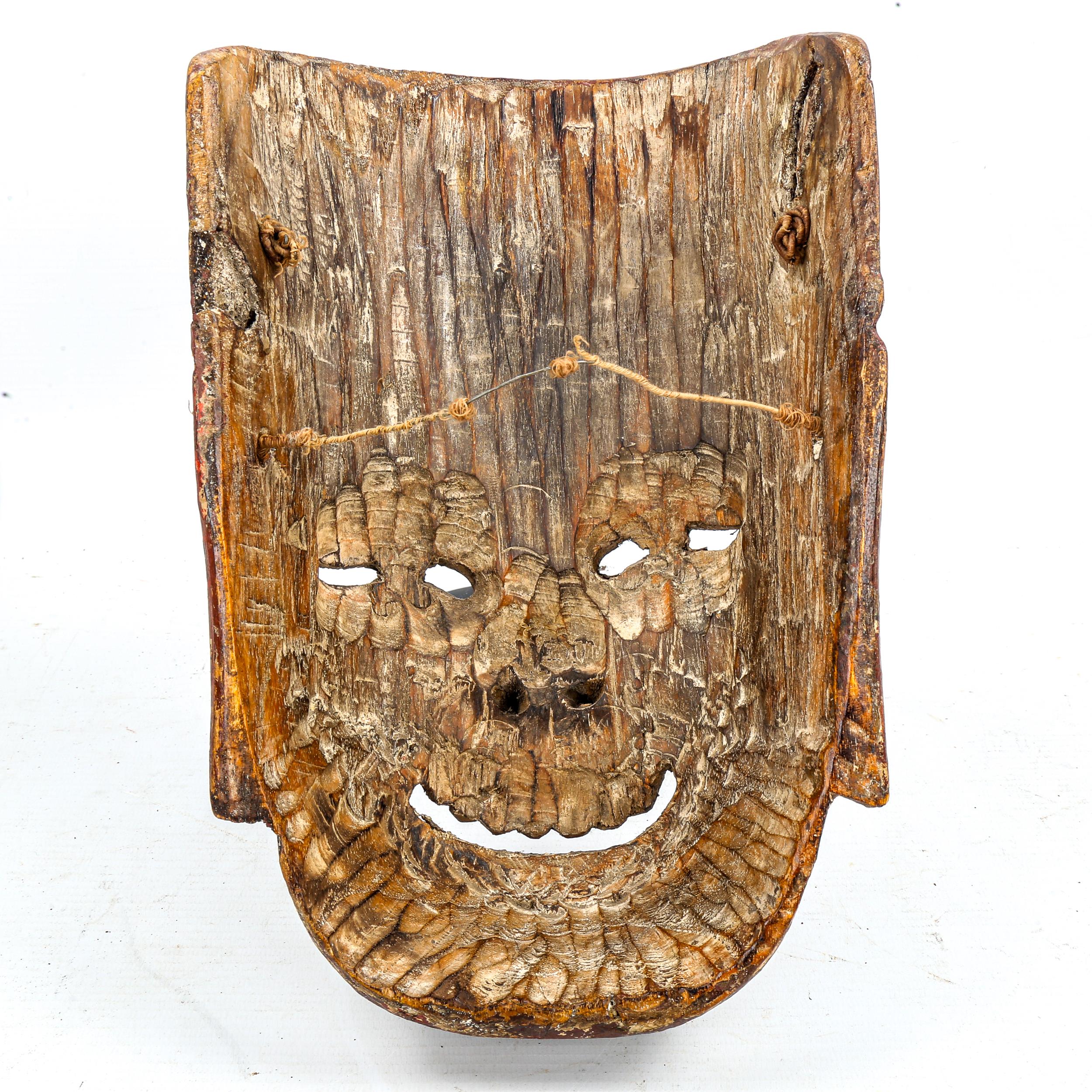 A Chinese Nuo opera mask of Tudi Gong, relief carved and painted wood, on wooden stand, height - Image 3 of 3