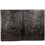 A pair of 17th century relief carved oak panels dated 1619, bearing the coats of arms of Thomas