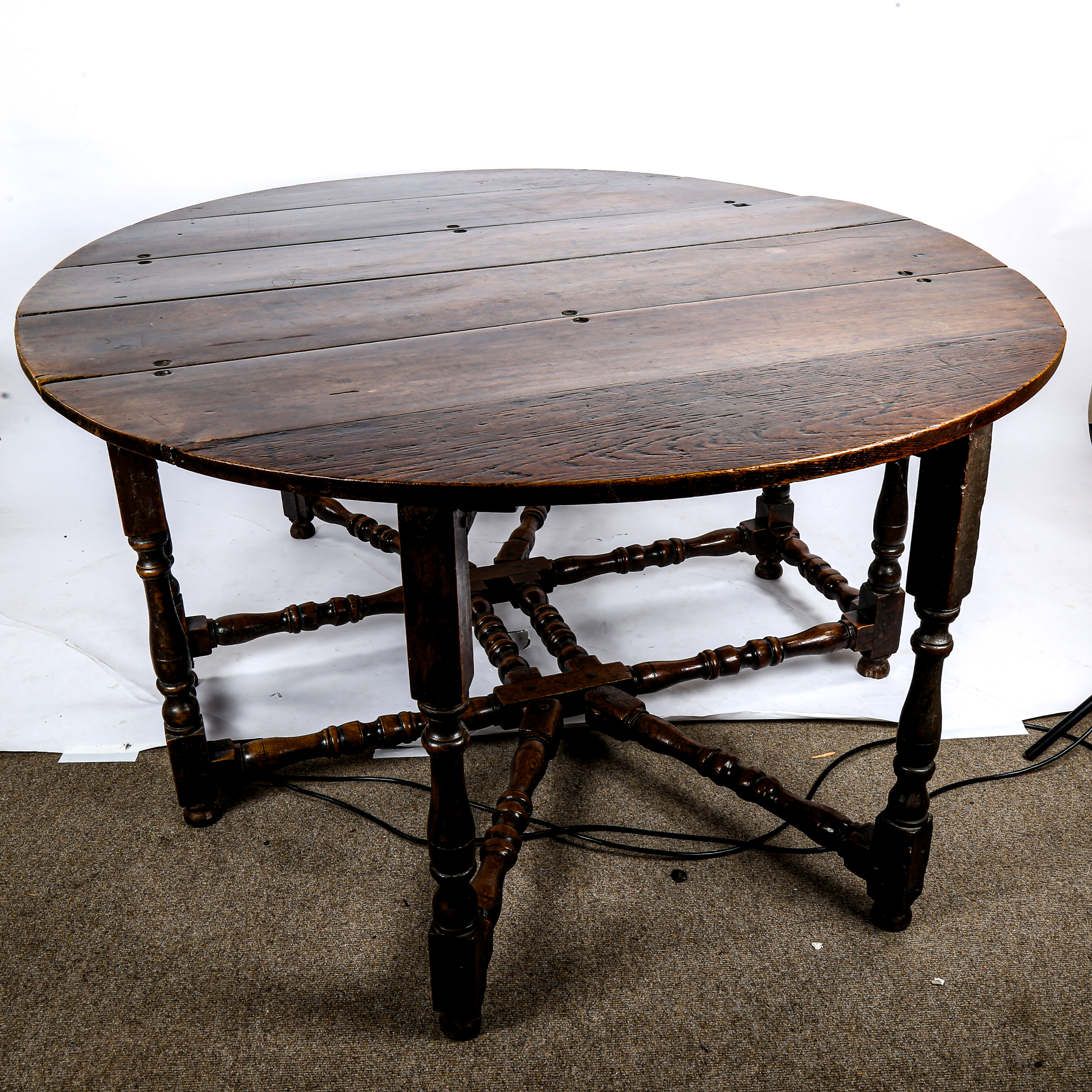 A large 17th/18th century oak gateleg dining table, on ring-turned legs with two frieze - Image 3 of 3