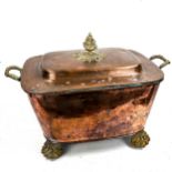 A copper and brass wine cooler and cover, with cast-brass mounts on brass lion paw feet, length