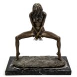 A contemporary patinated bronze sculpture, naked dancer, signed Laude, on marble base, height 24cm