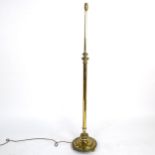 An Edwardian brass telescopic standard lamp, converted to electric