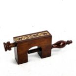 A Victorian Tunbridge Ware needlework clamp, rosewood with a band of micro-mosaic inlay, length 21cm