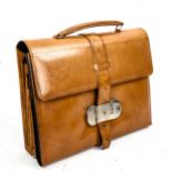 A Victorian tan leather travelling writing case, with green leather fitted interior, 28cm x 22cm