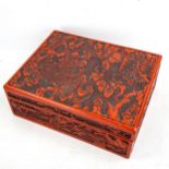 A Chinese relief carved red lacquer box, with phoenix decorated lid, mid-20th century, 33cm x 26cm x