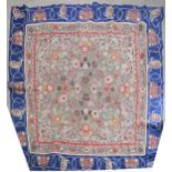A fine quality Oriental hand embroidered crewelwork table cover, the central panel intricately