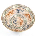A Chinese porcelain dragon bowl, probably mid-20th century, hand painted and gilded decoration,