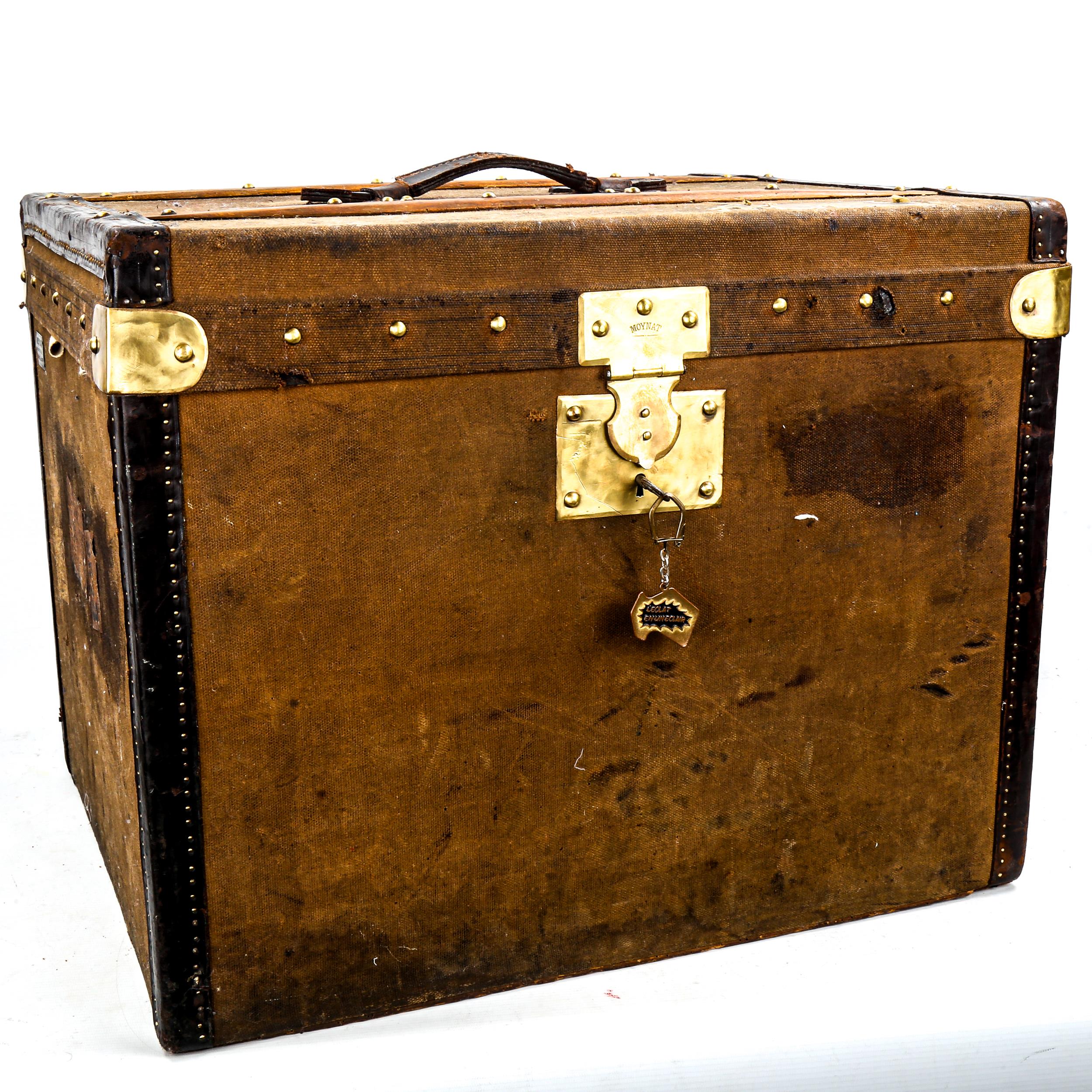 MOYNAT PARIS (now owned by LOUIS VUITTON) - a Vintage canvas-covered travelling trunk, with