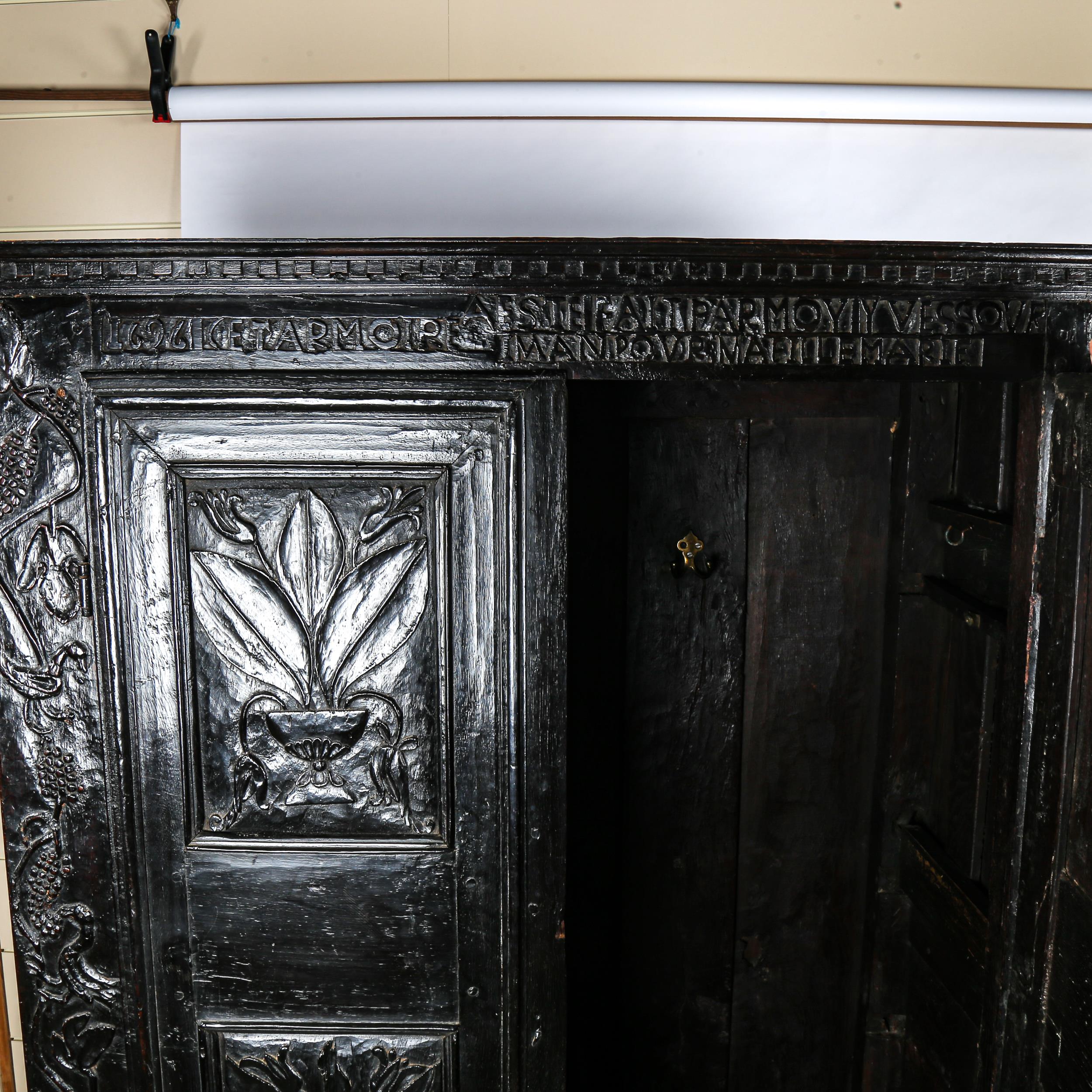 A 17th century French panelled oak 2-door armoire, original marriage inscription to the frieze dated - Image 2 of 3