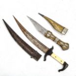 A Middle Eastern dagger with ivory grips, and a Chinese brass and white metal-mounted dagger and