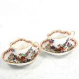 A pair of Meissen porcelain Imari pattern quatrefoil-shaped cabinet cups and saucers