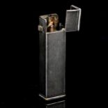 Vintage Dunhill pocket lighter, Cartier licence patent no. 405122, length 6.5cm Not currently