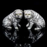 A pair of silver plated Bulldog design novelty cruets with glass eyes, height 5.5cm Plating slightly