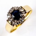 A late 20th century 18ct gold sapphire and diamond cluster ring, set with round-cut sapphire and