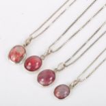 4 modern silver-mounted cabochon ruby pendant necklaces, on box link chains, largest pendant