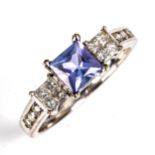 A modern 18ct white gold tanzanite and diamond dress ring, set with square modified tanzanite with