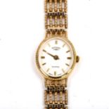 ROTARY - a lady's 9ct gold quartz bracelet watch, white dial with gilt baton hour markers and 9ct