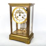An early 20th century brass-cased 4-glass 8-day mantel clock, by Payne & Co of London, white