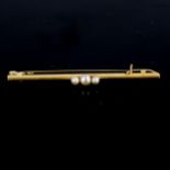 A mid-20th century 18ct gold 3-stone pearl bar brooch, hallmarks Birmingham 1963, brooch length 44.