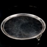 A George III circular silver salver, bead edge with engraved crest and motto "Touch Not The Cat
