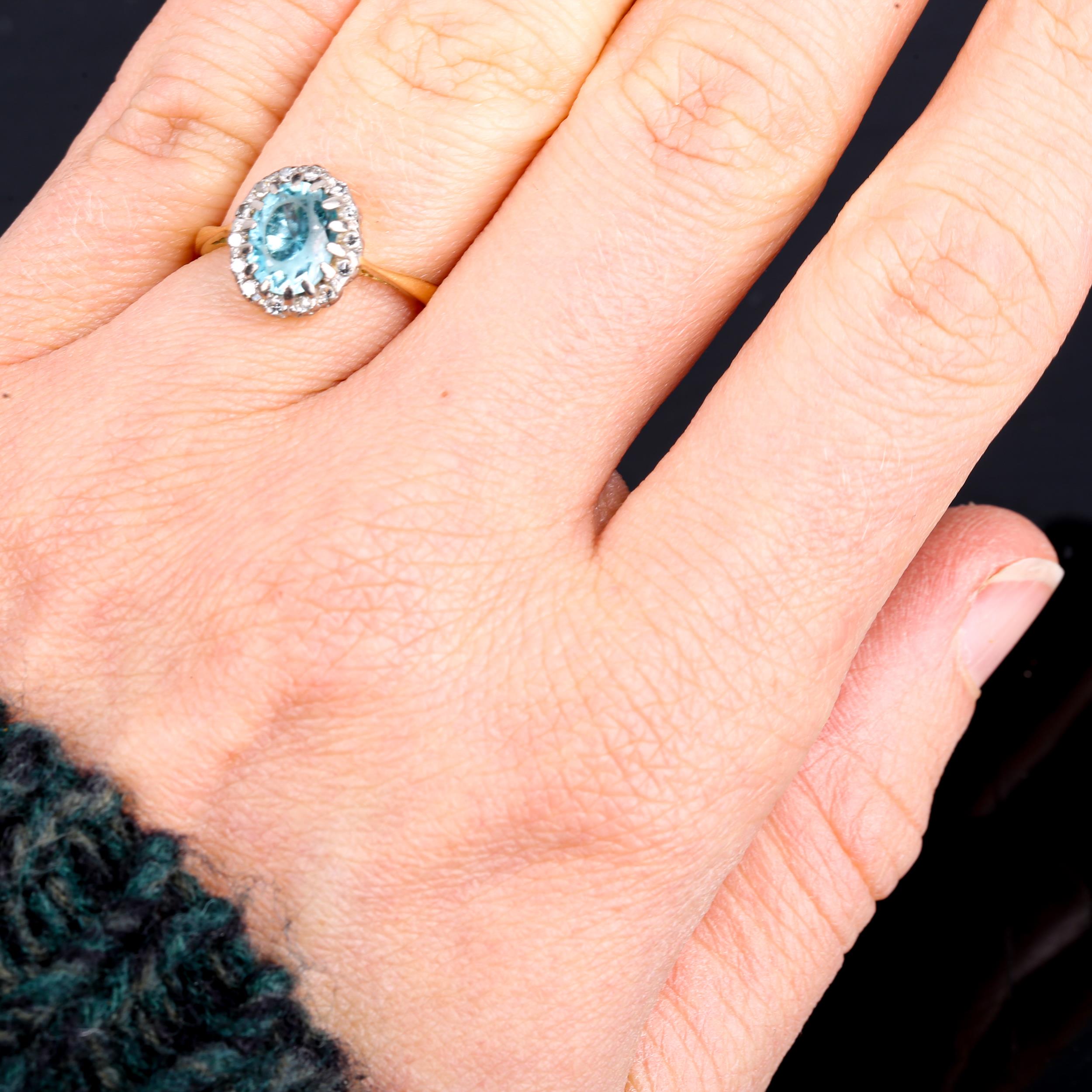 An 18ct gold blue zircon and diamond oval cluster ring, set with oval mixed-cut zircon and single- - Image 4 of 4