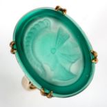 A mid-20th century 9ct gold green agate seal ring, intaglio carved agate with profile of