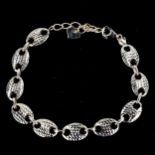 A modern 9ct gold Gucci link chain bracelet, faceted and polished hollow links, bracelet length