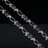 A Mexican sterling silver and cabochon amethyst necklace, maker's mark JE, necklace length 42cm,