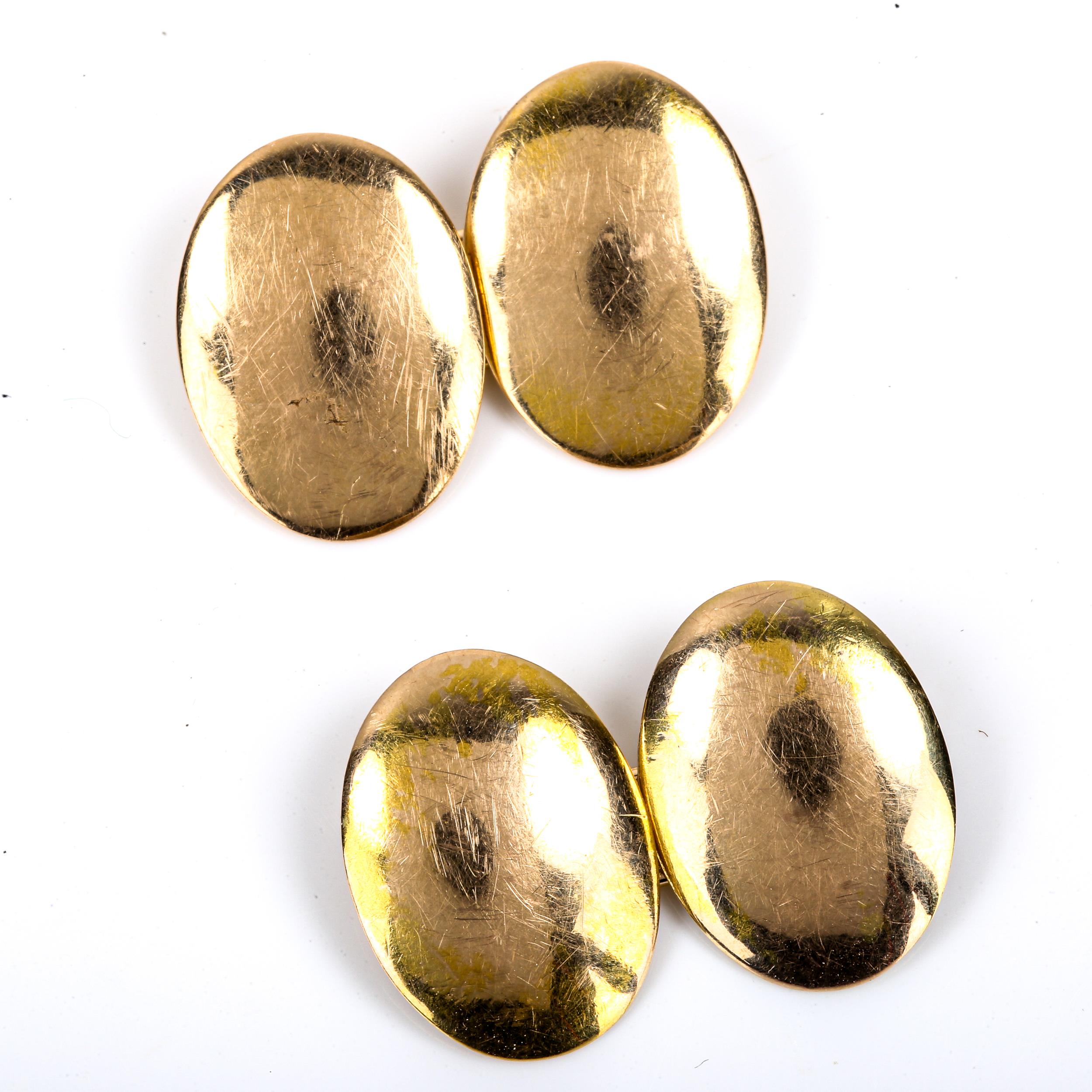 A pair of Victorian 15ct gold oval bombe cufflinks, possibly by John Taylor, hallmarks London