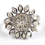 A modern sterling silver diamond cluster flowerhead ring, set with modern round brilliant-cut