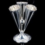 A Victorian silver triple bud vase, trumpet form with frilled rims and embossed base, by Horace