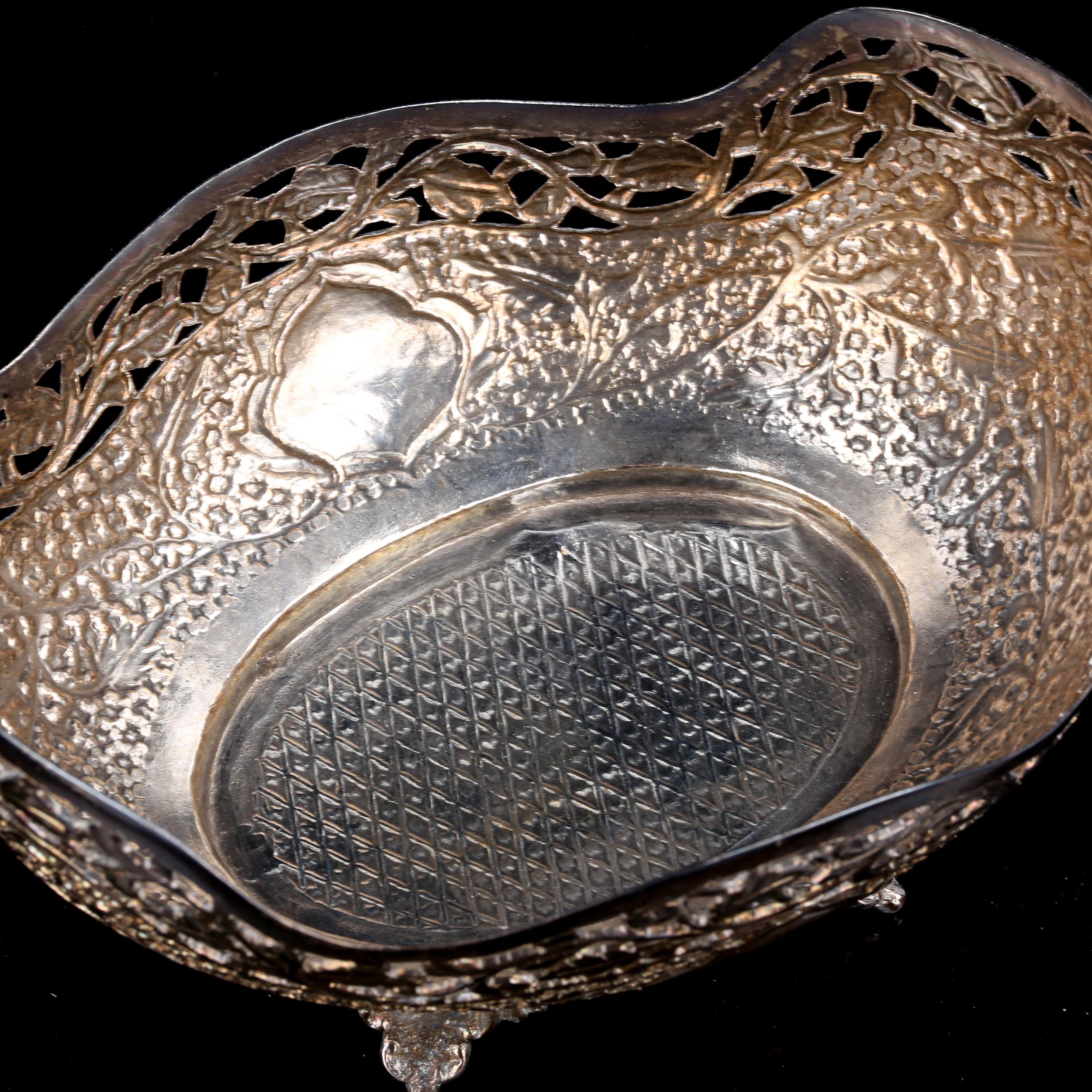 A Middle Eastern white metal bon bon basket, all over engraved floral decoration, marked 'Ali - Image 3 of 4