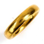 A heavy early 20th century 22ct gold wedding band ring, hallmarks London 1926, band width 4.5mm,
