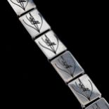 JENS TAGE HANSEN - a Vintage Danish stylised sterling silver and black enamel panel bracelet,