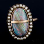 An Antique opal and pearl oval cluster ring, set with oval cabochon opal and split-pearls, setting